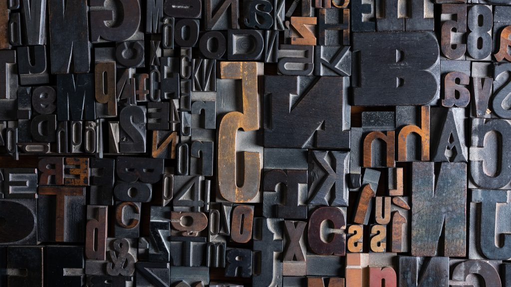 Collage of wood type, both letters and numbers