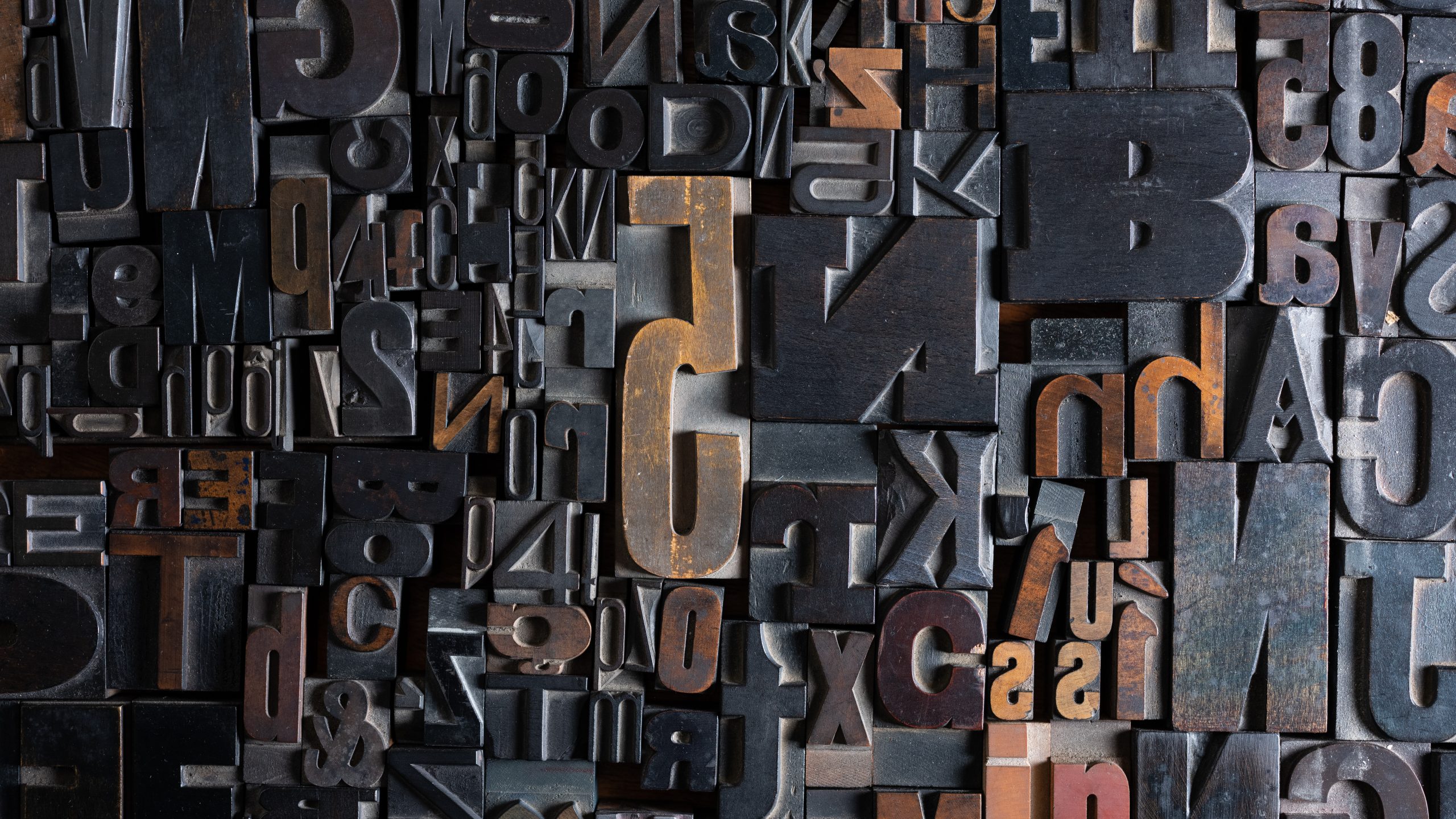 Collage of wood type, both letters and numbers