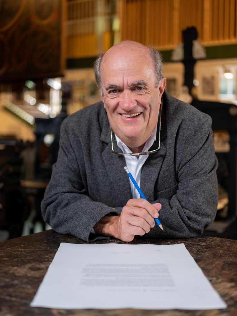 Colm Tóibín signing his short story at the National Print Museum