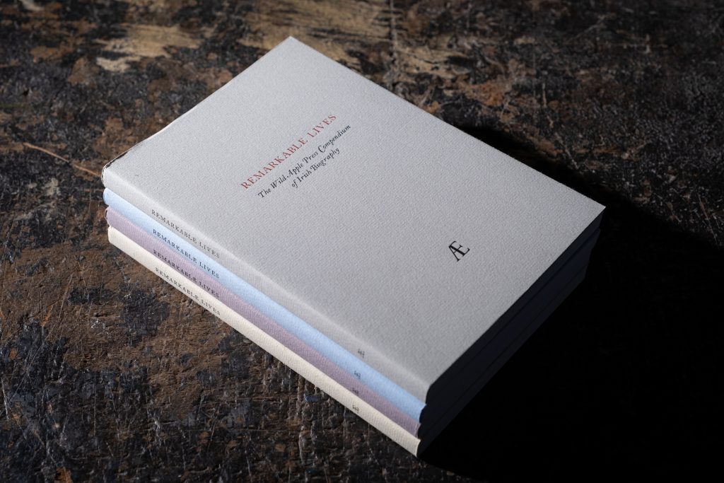 4 copies stacked together of the book 'Remarkable Lives'