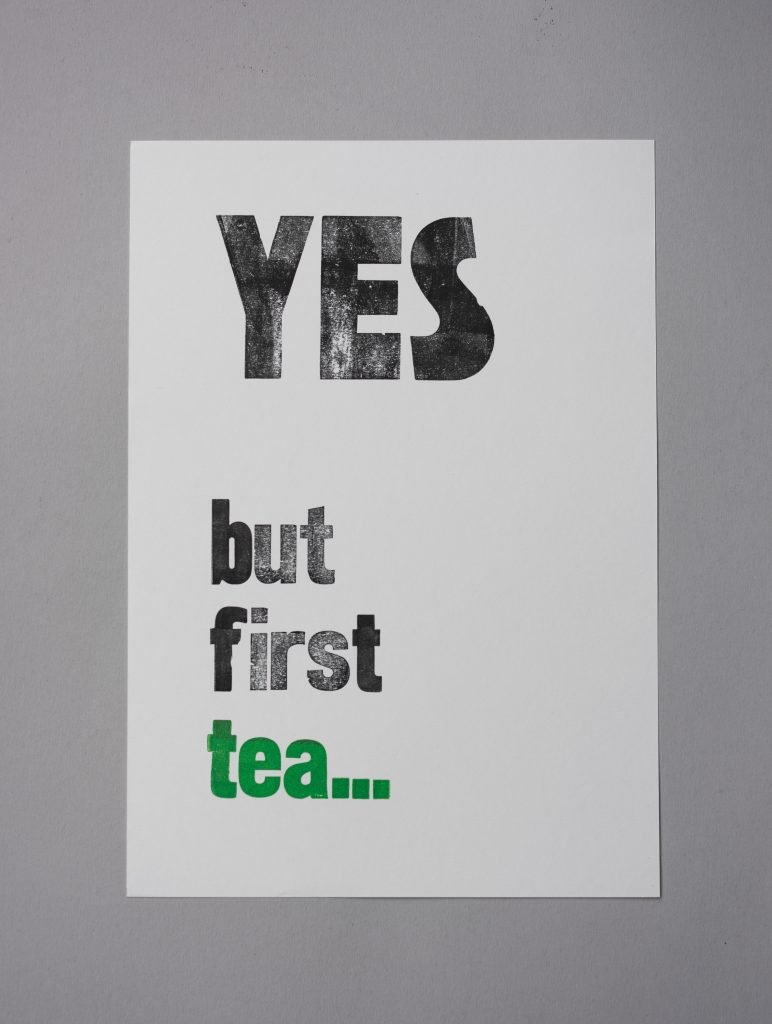 Letterpress poster print containing the text 'YES but first tea...'