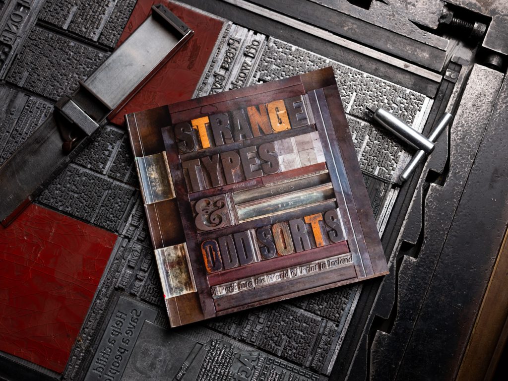 The book Strange Types and Odd Sorts sitting on a forme for the Sunday Press