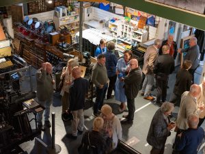 A view from above of attendees at the book launch of Strange Types & Odd sorts
